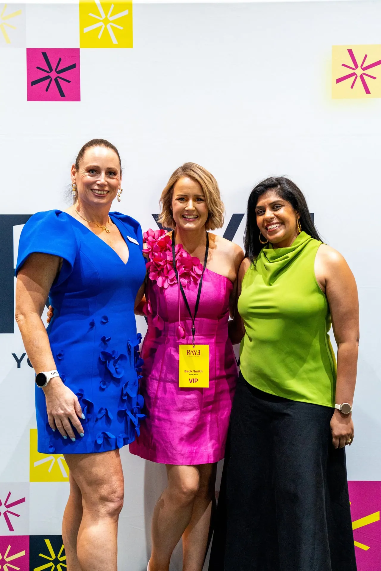 Three RAYE Haus members at a RAYE event